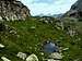 A tiny pond on the wide east ridge of the Breitspitze