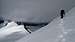 Traversing steep snow just below the summit of Jatt Peak