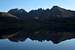 Wolf Mountain, Sawtooth Peaks, and Sawtooth Mountain Reflected on Goose Lake, Dawn