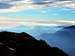 Azure ridges over Garda Lake seen from Cima d'Oro
